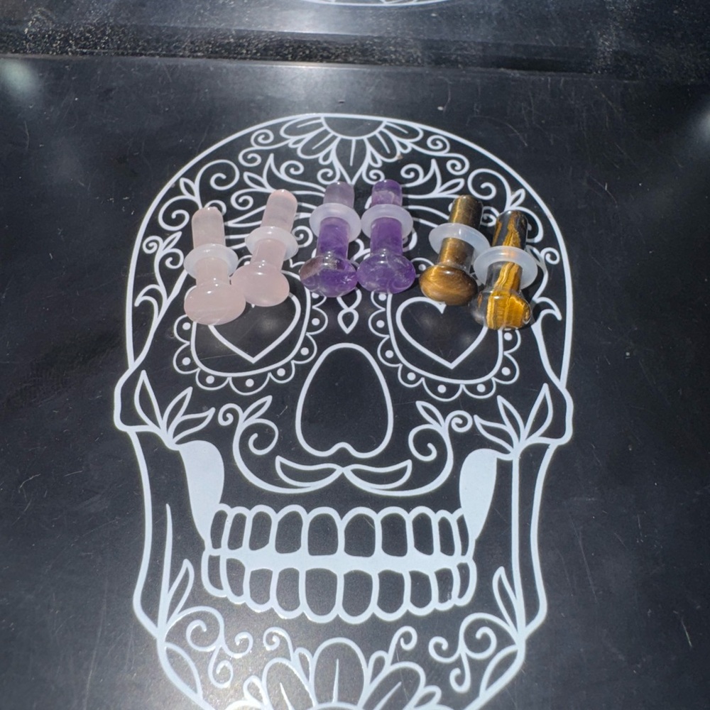 Elegant Glass Plugs in Pink, Purple, and Gold